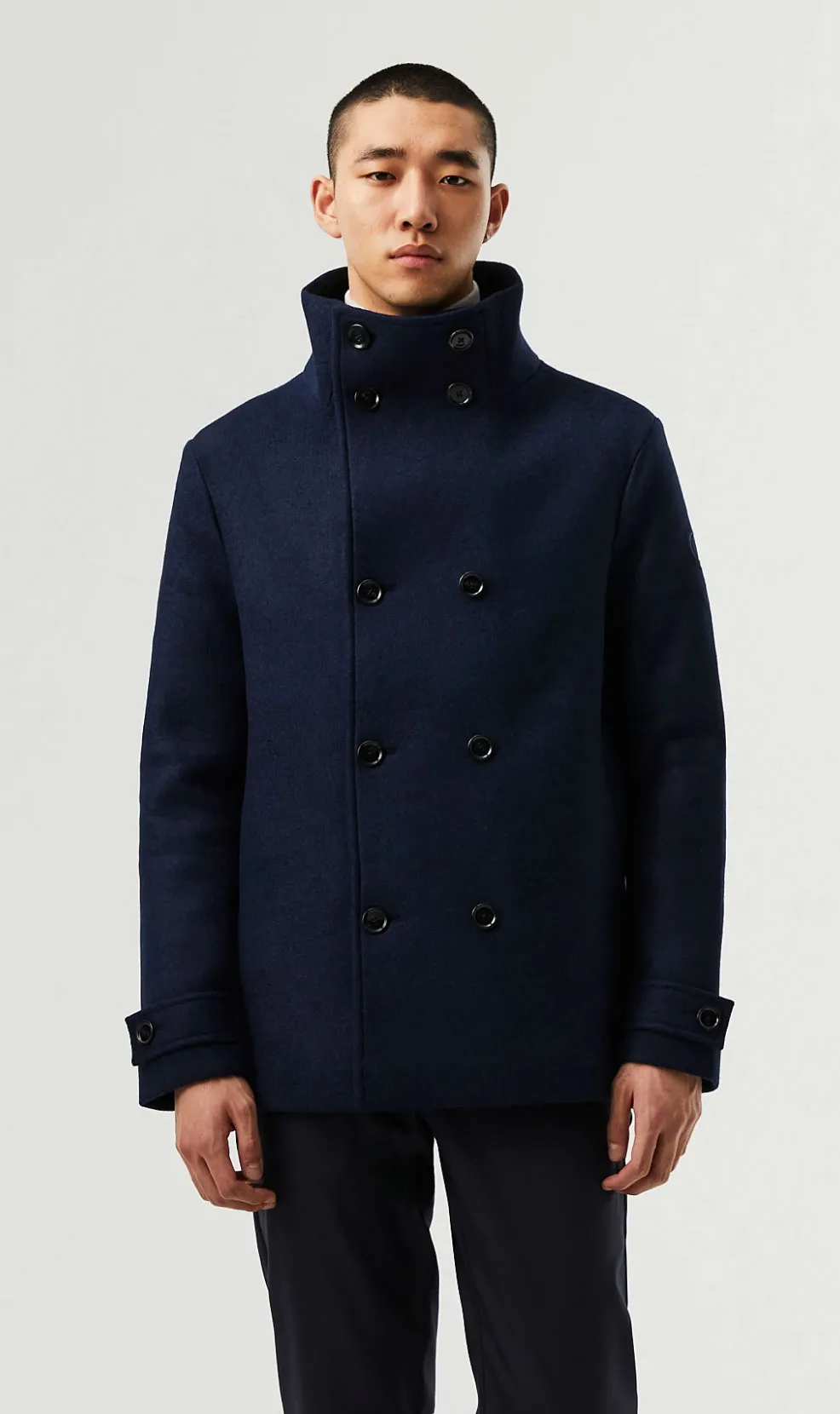 Apple Watch mockup showing HCC companion app screens